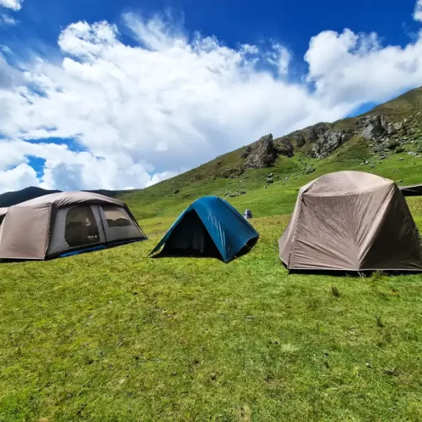 Luxury eco-friendly Inca Trail premium campsites with sleeping tents and a dining tent at the Andean mountains.