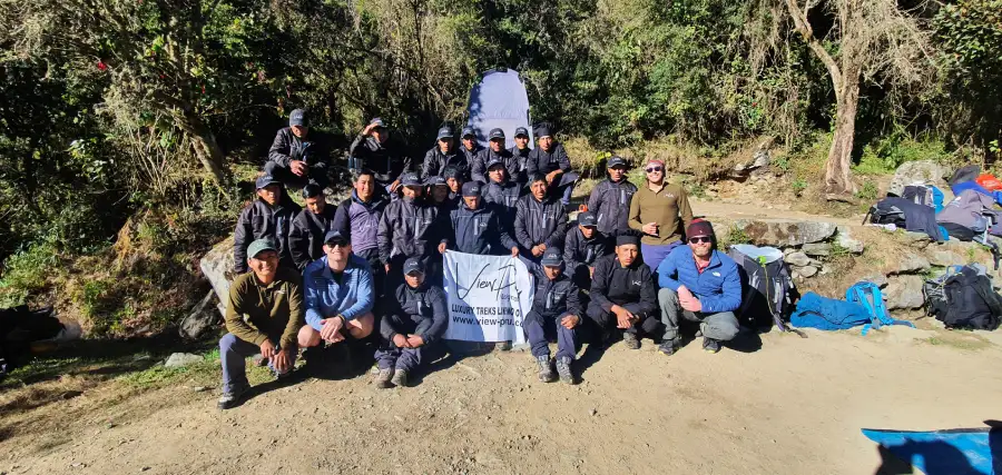 luxury inca trail for families support team porters Support team and porters assisting a family on the Luxury Inca Trail for Families, showcasing logistical preparation and teamwork.